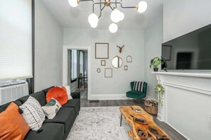 House, Multiple Beds, Balcony, Garden View (Chic Modern Gem w/ Style Suites) | Living area | TV