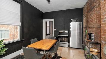 House, Multiple Beds, Balcony, Garden View (Chic Modern Gem w/ Style Suites) | Private kitchen | Fridge, microwave, oven, stovetop