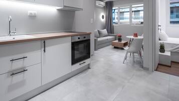 Apartment | Private kitchen | Full-sized fridge, microwave, oven, stovetop