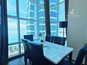 Deluxe Loft, 2 Bedrooms, Non Smoking, Sea View | Living area | 30-inch LED TV with digital channels - Seaview Maritime Suites by The Stay Hub (George Town)