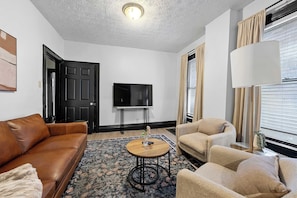 House, Multiple Beds, Patio, Garden View (Merion Village Residences Suites) | Living area | 42-inch flat-screen TV with digital channels