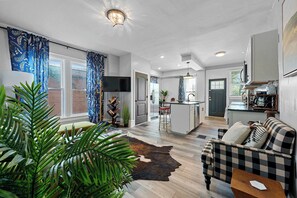 House, Multiple Beds, Patio, Garden View (Merion Village Residences Suites) | Living area | 42-inch flat-screen TV with digital channels