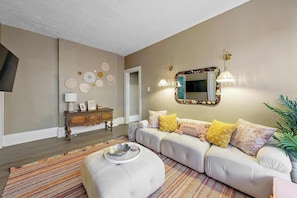 House, Multiple Beds, Patio, Garden View (Merion Village Residences Suites) | Living area | 42-inch flat-screen TV with digital channels