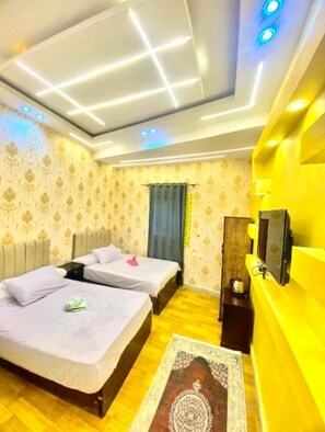 Deluxe Tek Büyük veya İki Ayrı Yataklı Oda, Balkon, Dağ Manzaralı | Ücretsiz kablosuz İnternet 