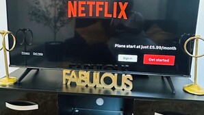 A television displaying the Netflix logo with options to sign in or get started. - Cosy and Comfy Double Room with Private Bathroom, Close to o2 Arena (London)