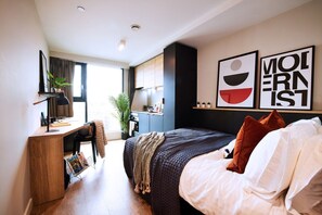 1 slaapkamer, een bureau, een strijkplank/strijkijzer, gratis wifi