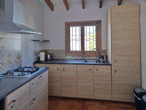 Fridge, microwave, cookware/dishes/utensils