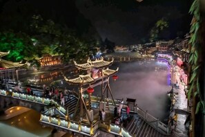 A traditional Chinese water town with wooden walkways and buildings. - Fengyuanju Inn (Fenghuang County)