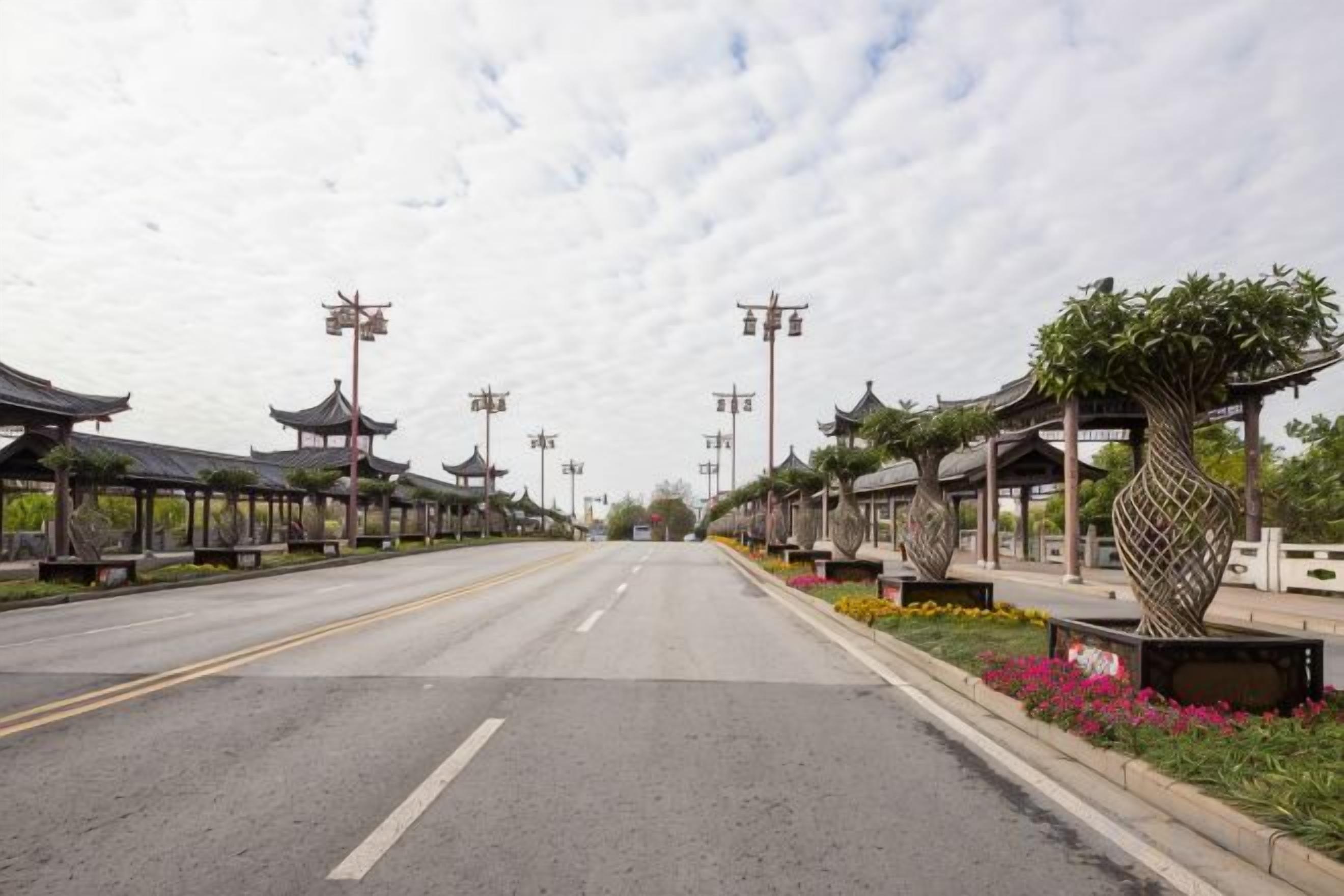 A street with traditional-style buildings and a clear sky.