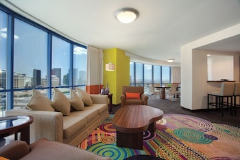 Panoramic Room | Living area | 65-inch flat-screen TV with cable channels, pay movies at Masquerade Tower at Rio Hotel & Casino