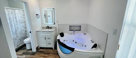 Shower, jetted bath, hair dryer, towels