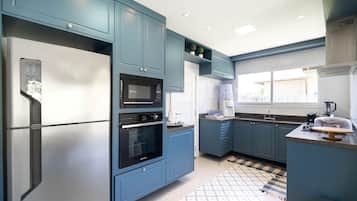 Villa | Private kitchen | Fridge, microwave, oven, stovetop