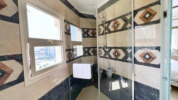Hair dryer, towels, soap, toilet paper