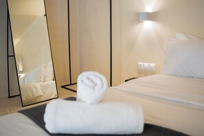 1 dormitorio, sistema de insonorización, tabla de planchar con plancha