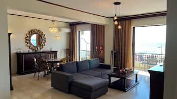 Apartment, Sea View | Living room | 50-inch Smart TV with digital channels, Netflix, streaming services