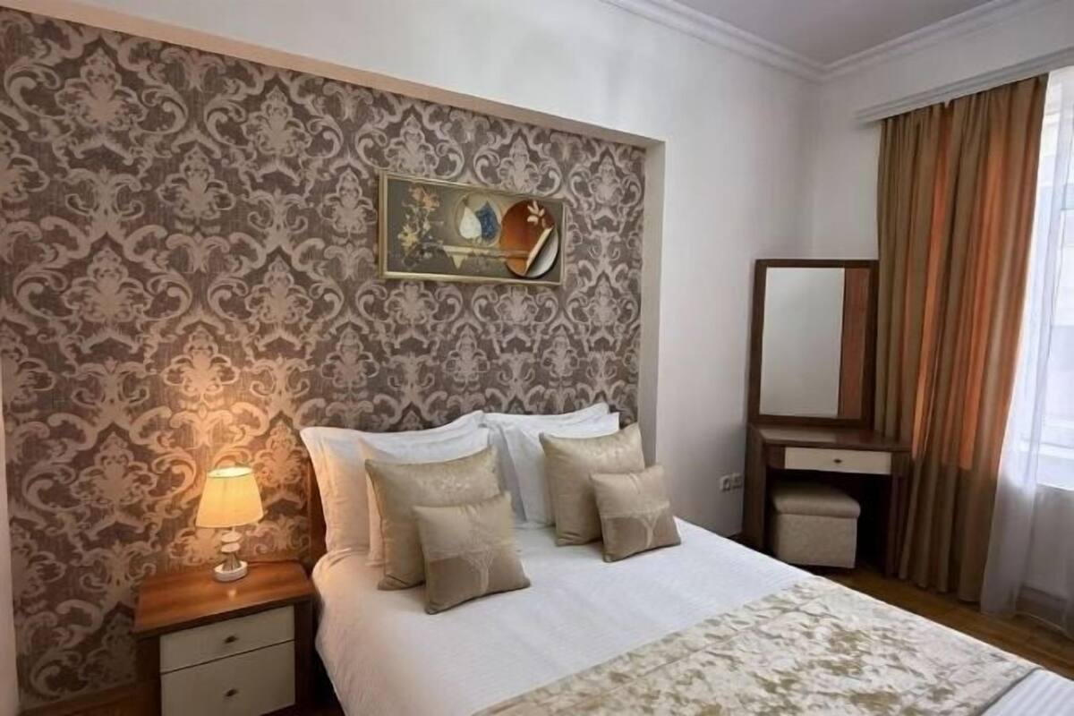 Desk, laptop workspace, blackout curtains, soundproofing