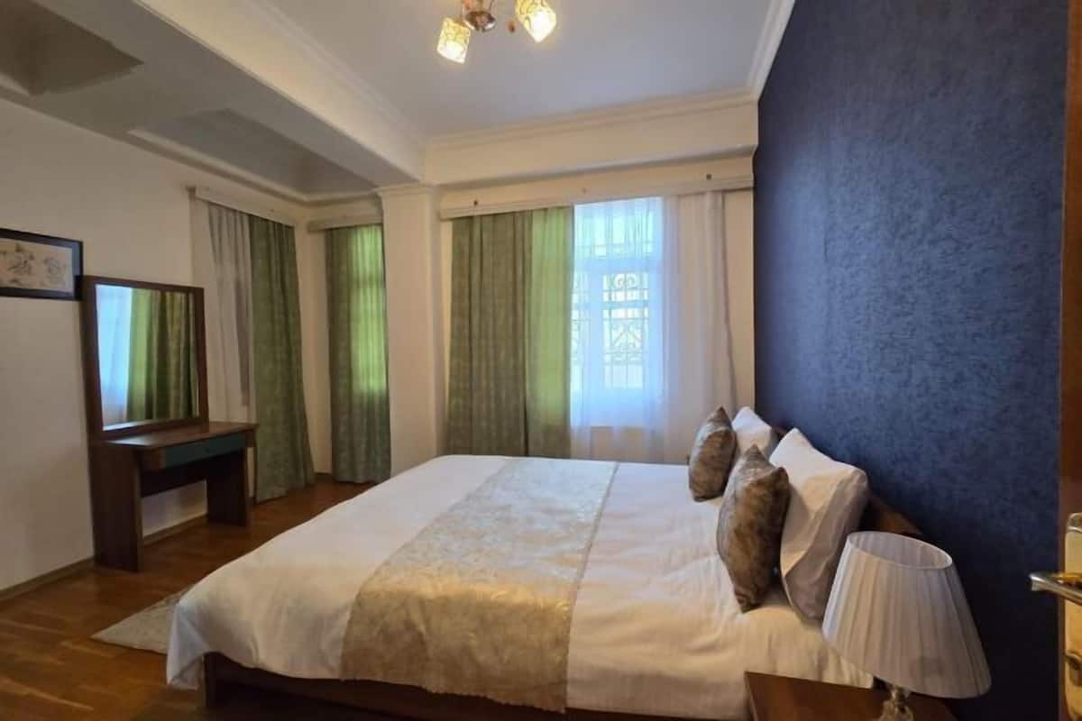 Desk, laptop workspace, blackout curtains, soundproofing