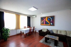 Desk, laptop workspace, blackout drapes, soundproofing - Old City Hatefi Apartments (Baku)