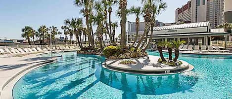 Appartement, 1 kingsize bed met slaapbank (Long Beach Resort 4-1305) | Zwembad | Een buitenzwembad en een verwarmd zwembad