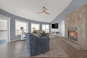 Smart TV, fireplace, books
