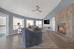 Smart TV, fireplace, books