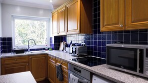 Apartment | Private kitchen | Fridge, microwave, oven, stovetop