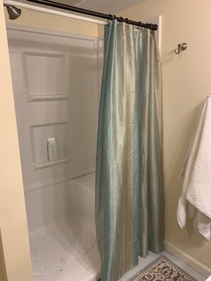 Shower, eco-friendly toiletries, hair dryer, towels