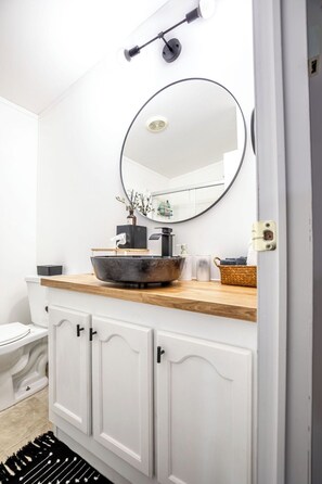 Hair dryer, towels, soap, toilet paper