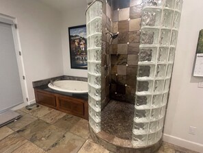 Shower, jetted bath, towels, soap