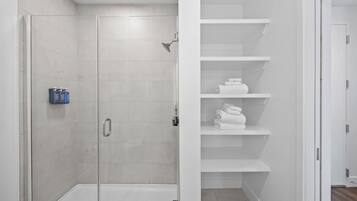 Hair dryer, towels, soap, shampoo