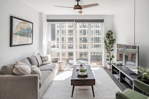 55-inch flat-screen TV with digital channels, Netflix, Hulu - Anthem House Huntsville MidCity, powered by Placemakr (Huntsville)