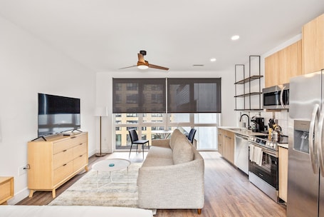 55-inch flat-screen TV with digital channels, Netflix, Hulu