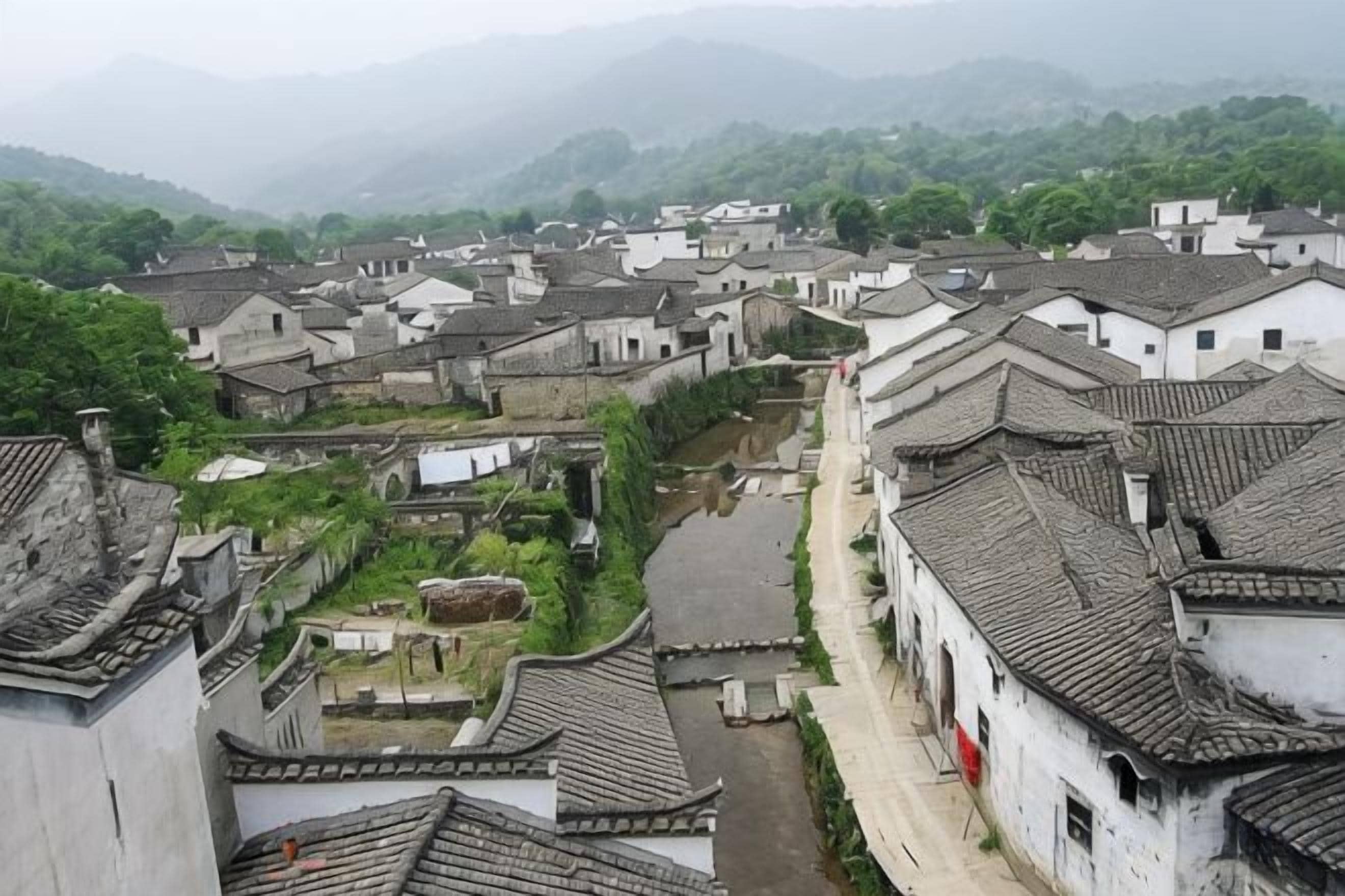 A traditional village with narrow streets and old buildings.