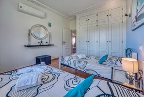 3 habitaciones, tabla de planchar con plancha y acceso a internet
