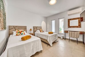 3 habitaciones, tabla de planchar con plancha y acceso a internet