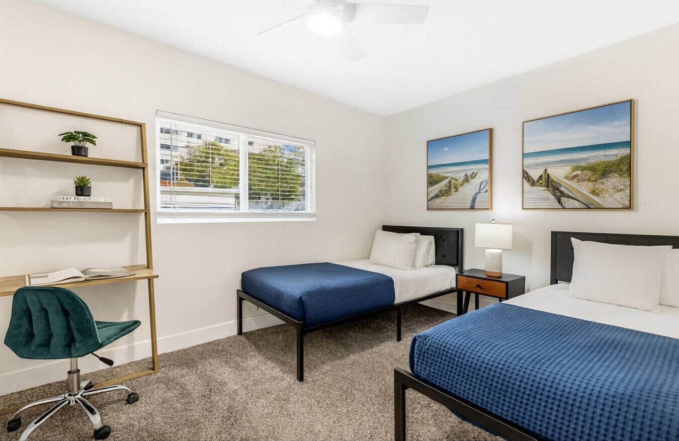 2 bedrooms, desk, iron/ironing board, travel crib