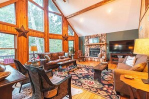 Smart TV, fireplace, DVD player, books