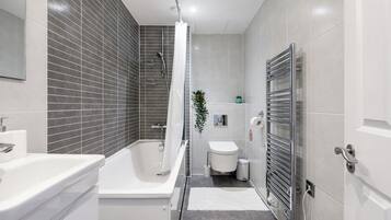 Hair dryer, towels, soap, shampoo