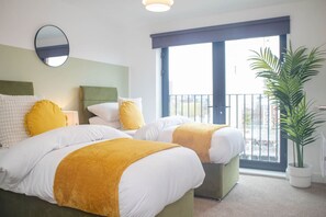 2 habitaciones, tabla de planchar con plancha, wifi y ropa de cama 