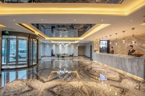 Orange Hotel (Daxing Qingyuan Road Metro Station Store)