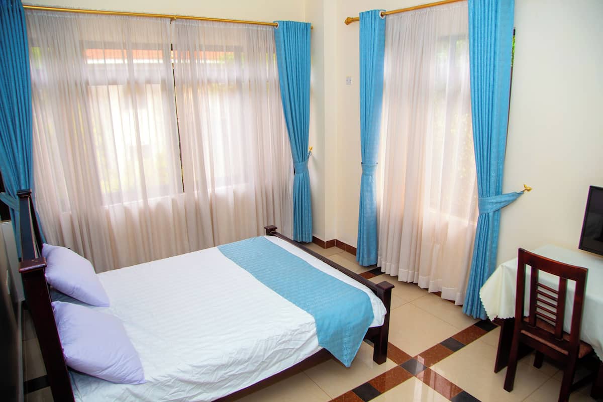 Standard Double Room | In-room safe, desk, laptop workspace, iron/ironing board
