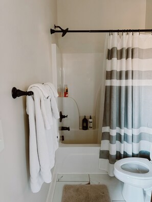 Hair dryer, towels, soap, toilet paper