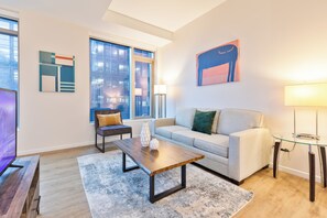 Appartement Deluxe, cuisine | Aire de séjour