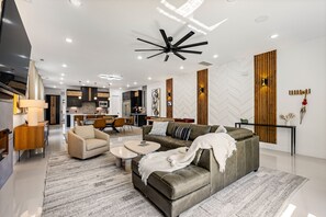 TV, fireplace - Stylish Townhouse with Chef's Kitchen and Nearby Mountain Bike Trails (Bentonville)