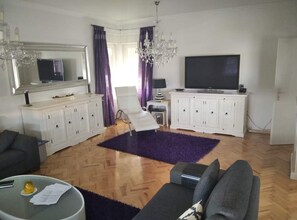 House (Five Bedroom Holiday Home with Terrac) | Living room | 32-inch flat-screen TV with cable channels - Holiday Home Dugo Selo M&A (Dugo Selo)