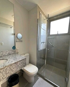 Shower, hair dryer, towels, soap