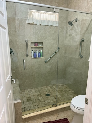 Shower, towels, soap, toilet paper