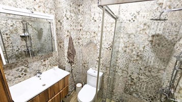 Shower, eco-friendly toiletries, hair dryer, towels