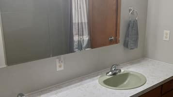 Shower, towels, soap, shampoo