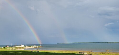 "Sunset Beach" Camper in Fairport on 435' of Lake Michigan shoreline